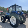 120 л.с. используется New Holland 1204 трактор 4WD с кабиной