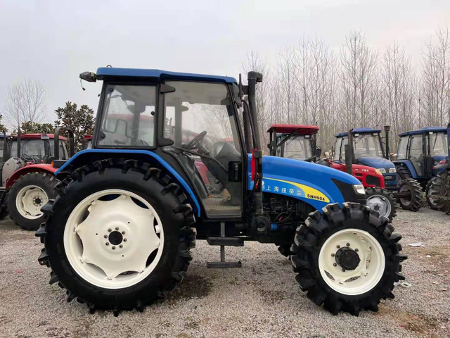 Ферма использовала второе колесо колеса Tractor New Holland 90HP SNH904