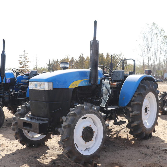 Использован Международный New Holland SNH754 4WD Tractor